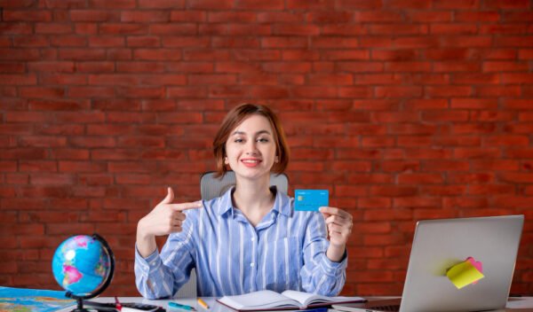 front-view-travel-agent-her-working-place-map-indoors-manager-operator-agency-world-document-occupation-worker